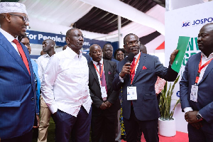 President Ruto (in white) with Dr Siaw Agyepong (holding the microphone) with other stakeholders