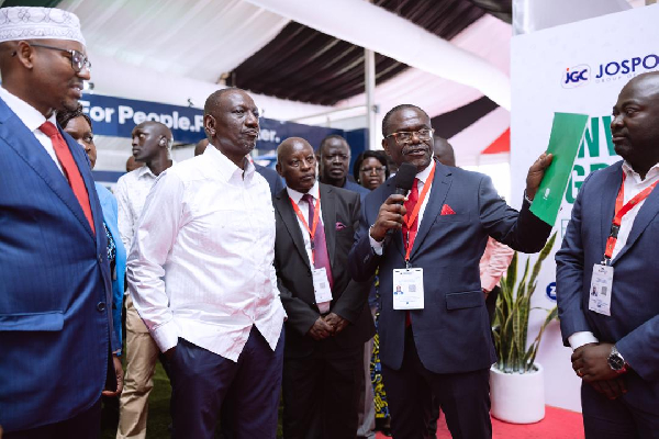President Ruto (in white) with Dr Siaw Agyepong (holding the microphone) with other stakeholders