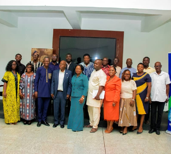 Dr Braimah with some participants at the lecture