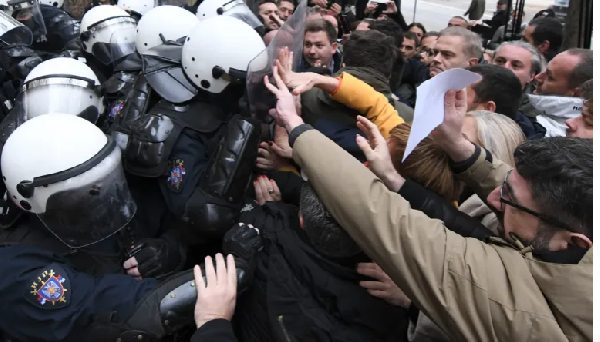 Skirmishes take place between police and protesters demanding arrests over a deadly roof collapse