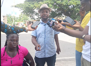 Clifford Owusu Ansah, financial secretary for PWDs in Asokwa speaking to the media