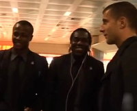 Andre Ayew (L) with is teammates at the airport