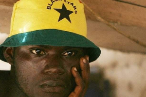 A photo of a sad Black Stars supporter