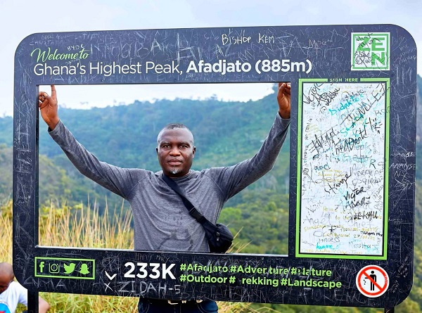 Journalist, Dela Ahiawor at the top of Mt. Afadja