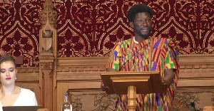 Cheddar speaking in a committee room in UK's parliament |Photo: Culled from Cheddar's UK Parliament