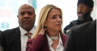 Pam Bondi arrives to testify at a closed-door interview with the HouseOversight Committee, May 29