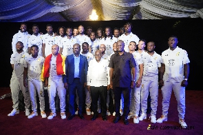 Black Stars players in a group photo with president Akufo-Addo, sports minister and GFA boss