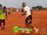 Jordan Ayew (R) taking on his marker
