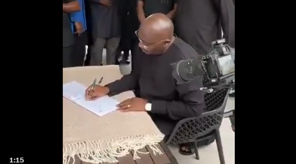 Dr Bawumia signing the book of condolence