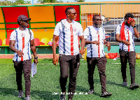 Black Stars assistant coach, John Paintsil (infront) with his coaching staff