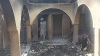 One of di houses wey burn as a result of di incident on Wednesday
