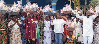 Ghana Gas CEO Adjobah Blay in white with the widows