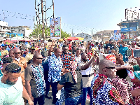 Alan Kyerematen with his team when they visit the Kantamanto Market