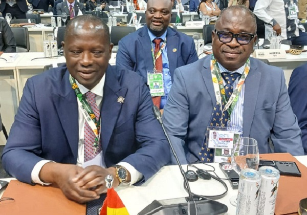 Lands minister Emmanuel Armah-Kofi Buah (L) with Issifu Seidu (R) at the pre-COP leaders' summit
