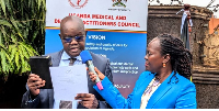 Prof Joel Okullo, the UMDPC chairperson takes oath during the swearing in ceremony in Kampala