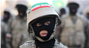 A member of Iranian volunteer militia attends a march in Tehran in Jan. 2025, before the current war