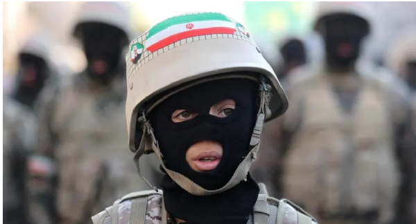 A member of Iranian volunteer militia attends a march in Tehran in Jan. 2025, before the current war