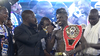 Holy 'Jaw Breaker' after defending his IBF African Featherweight title