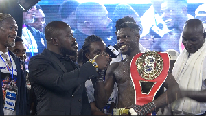 Holy 'Jaw Breaker' after defending his IBF African Featherweight title