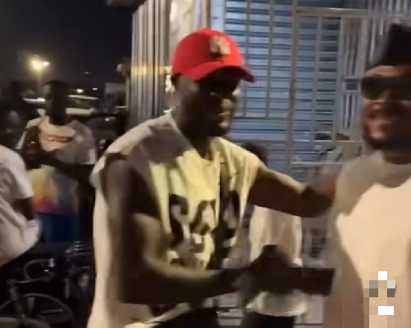 Sibo (L) greeting a fan during his welcoming