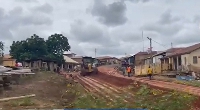 A grader on the road of Assin Akonfudi
