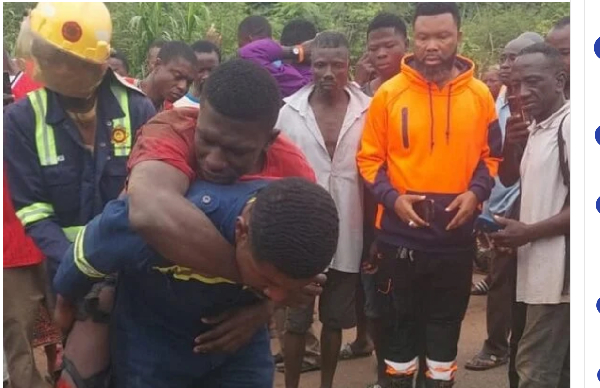 The accident victim strapped at the back of one of the fire fighters