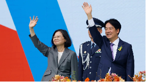Taiwan's former President Tsai Ing-wen and new President Lai Ching-te wave during Lai's inauguration