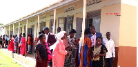 Bwema Seed Secondary School Parents at one of the new blocks after attending an emergency meeting