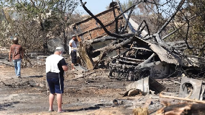 Settlers at Havat Gilad say houses there were burnt down by Palestinians. Police say the cause was a