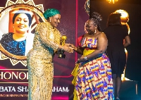 Hajia Abibata Shanni Mahama Zakariah receiving the award