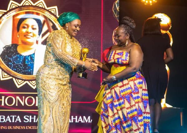 Hajia Abibata Shanni Mahama Zakariah receiving the award