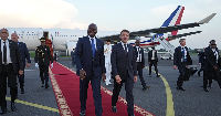 Emmanuel Macron, (R), is greeted by Prez Brice Oligui Nguema upon his arrival in Gabon, Nov 2025