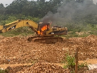 An escavator on fire