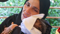 A Palestinian mother mourns her baby daughter Rahaf Abu Jazar, who died of cold in a tent camp