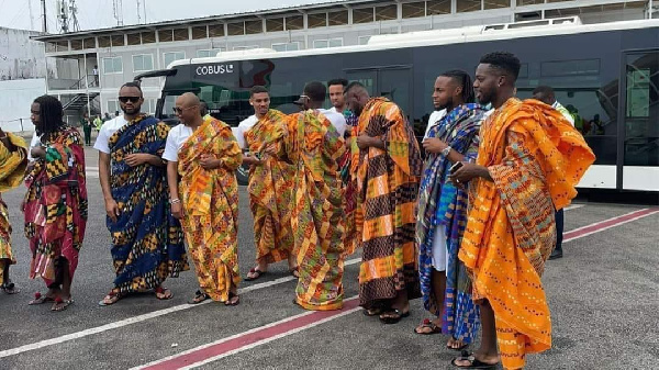 Black Stars players in Kente