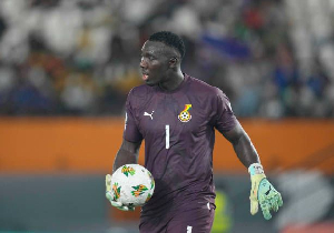 Richard Ofori holding the ball during a game