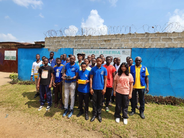 Samira De (in pink) with beneficiaries of Project REY