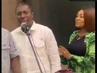 Alexander Afenyo-Markin (in white) singing Catholic Hymnal 350 – ‘Guide Me, O You Great Redeemer’