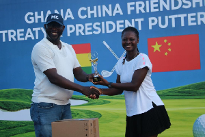 A photo of Catherine Fabbi (L) receiving her award