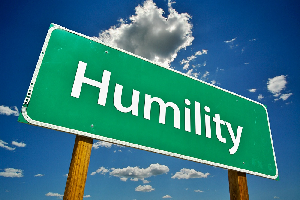 File photo of a signpost showing humility