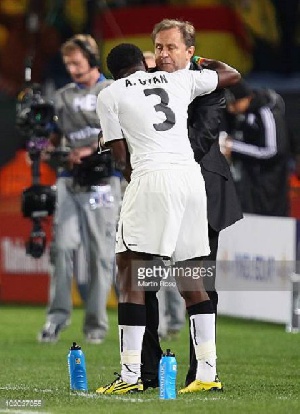 Gyan embraces Milo during the 2010 World Cup