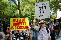 People march towards 26 Federal Plaza as they protest against Immigration and Customs Enforcement