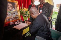 President John Dramani Mahama signs the condolence book