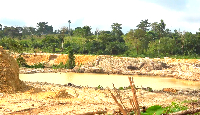 File photo of galamsey pit filled with water