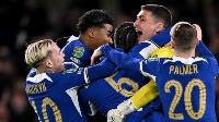 Chelsea players celebrating their penalty shootout win
