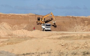 Excavator Works On Guinea's Bauxite Fields