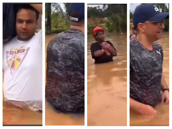 Snipped of residents struggling through knee-deep water