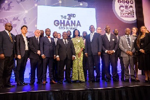 President Akufo-Addo flanked by some participants of the 3rd Ghana CEO Summit