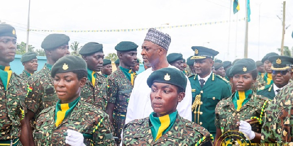 Interior minister, Mohammed Mubarak Muntaka inspecting a guard of honour