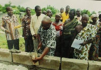 Mr. Samuel Dorfe laying the block to signify the commencement of the work